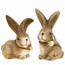 Product Decorative figures rabbits with feather and wooden pearl brown assorted 7cm x 4.9cm H 10cm 2pcs