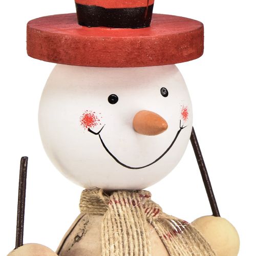 Product Snowman made of wood decorative figure with hat red natural H20.5cm